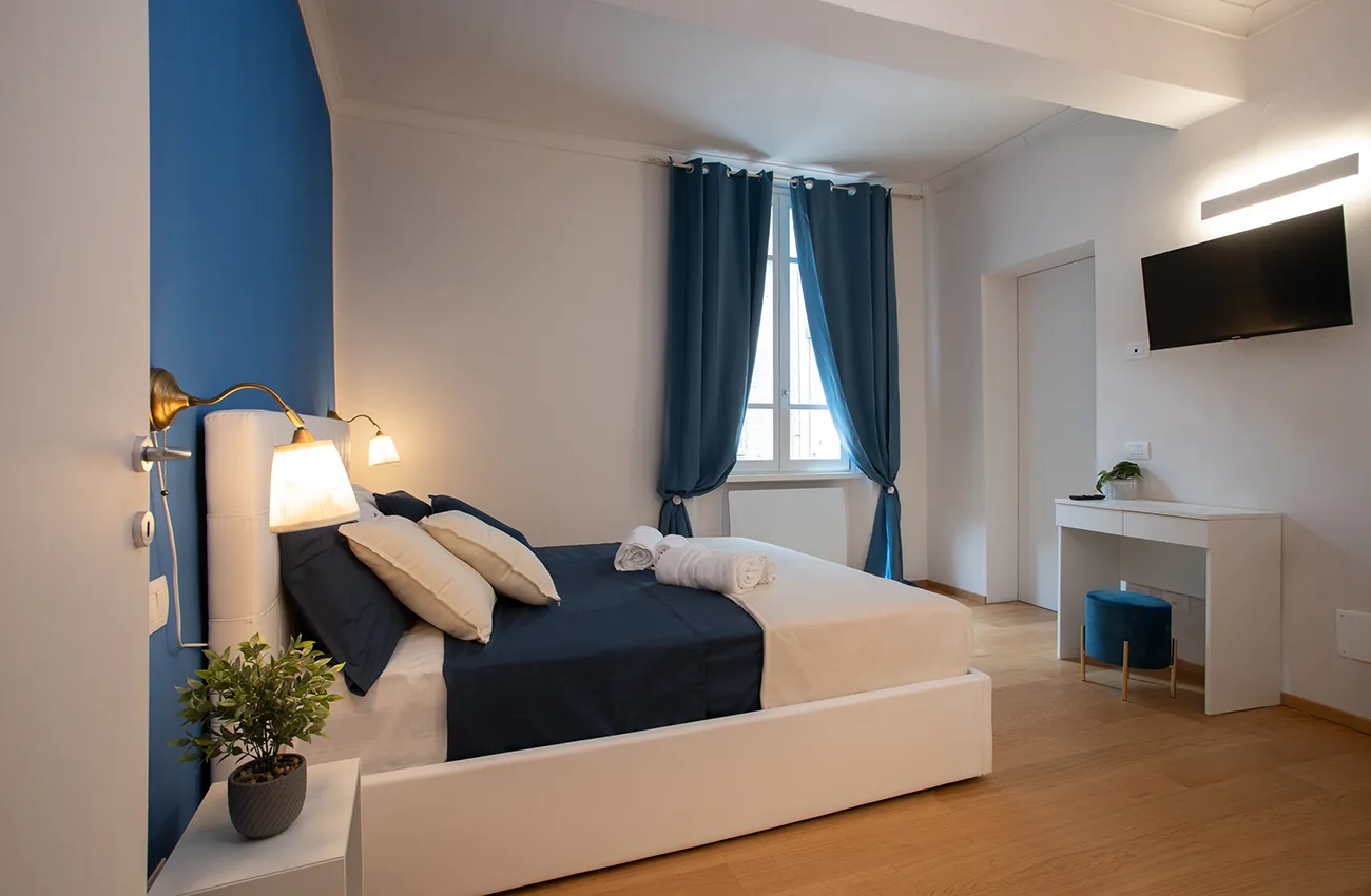 Freedom Suites - Appartamento Parma - camera da letto Blue foto2